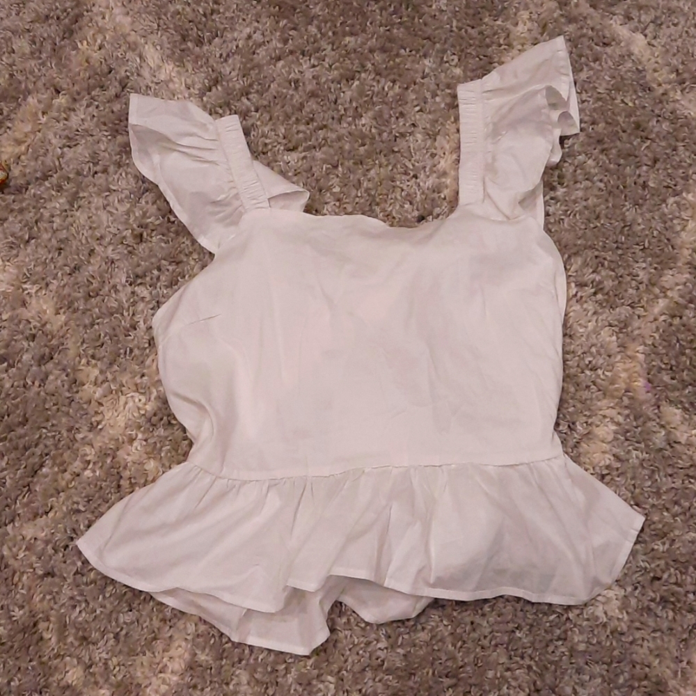 Open- back shirt from love by Chelsey